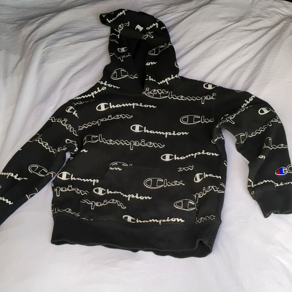 Black and white boys size 6 pull over All over covered logo Champions sweatshirt